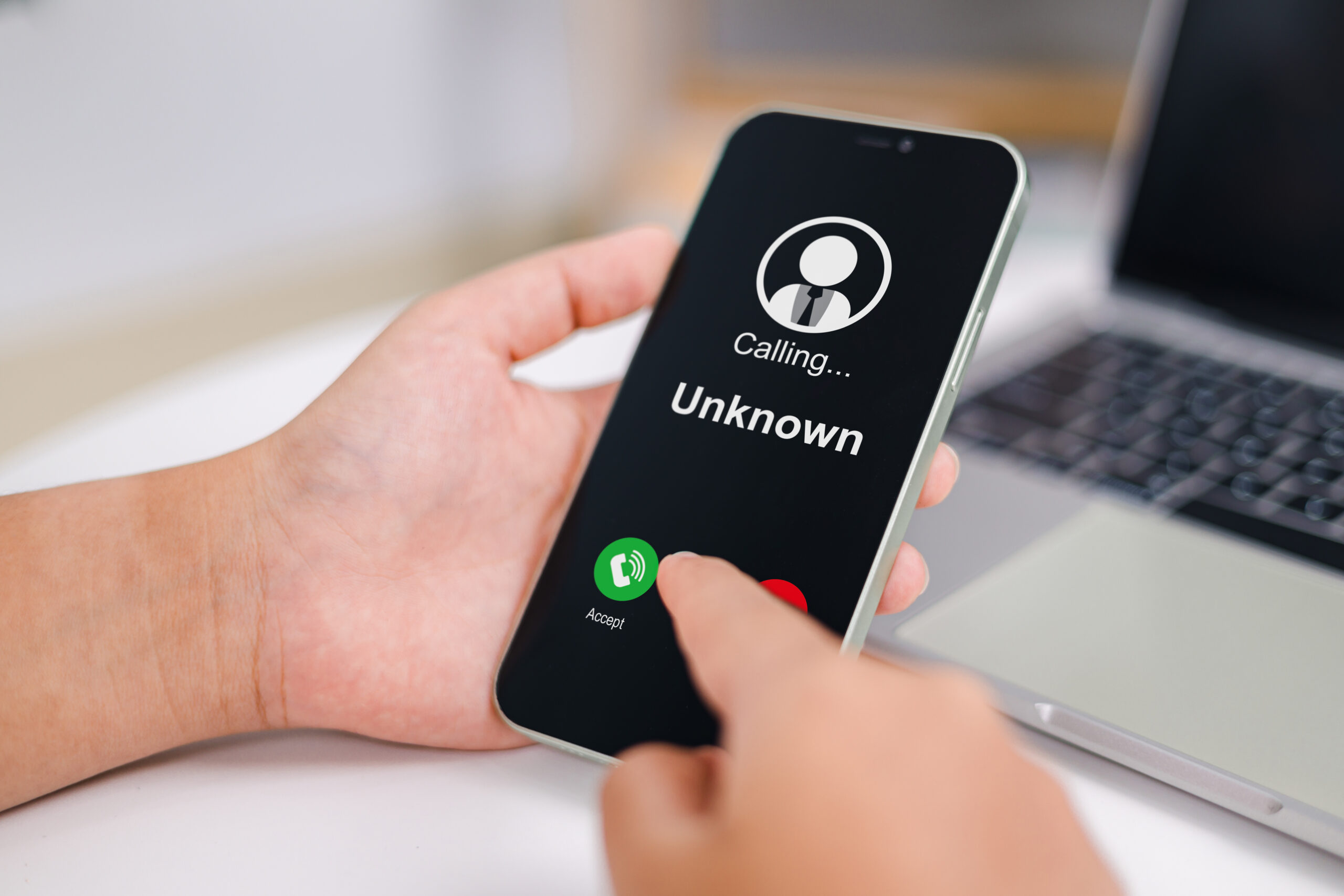 Woman receives a phone call from an unknown number. Concept of scammers or strangers, fraud, and contact to sell mobile internet promotions, spam, fake identity, scammer, scam with mobile phone.