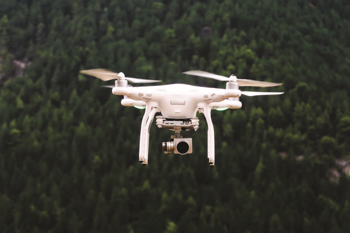 A drone flying over the forest