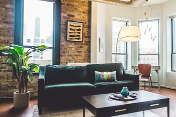 View on the living room of a decorated and bright flat.