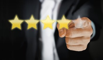 A person gives a five star rating.
